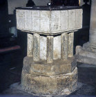 Twelfth century Norman font, St Giles Church, Merston, Sussex, England