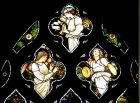Musical angels in tracery of St Catherine window, Edward Burne-Jones, Christchurch Cathedral, Oxford, England