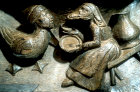 Misericord of fox-headed woman and man-headed fowl, 1470, St David