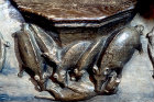Misericord of a boar, a sow and three piglets seizing a fox, 1470, St David