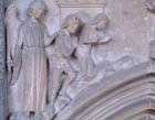 The Expulsion of Adam and Eve from Eden medieval stone relief number 11 Chapter House Salisbury Cathedral
