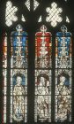 Three apostles from 1350 Crecy window, Gloucester Cathedral, Gloucestershire, England