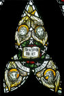 Symbols of the four evangelists in the tracery of window no.3, south nave aisle, nineteenth century, by Powell, Exeter Cathedral, Devon, England