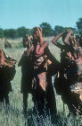 Kua Bushman women ready to trek, Kalahari, Southern Africa