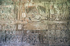 Carved relief of judgement of Yama who sits with multiple arms on buffalo and points to road leading to heaven and hell, Angkor Wat temple, Cambodia