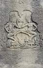 Apsaras (female spirits of clouds and water), on main gate, third enclosure, south side, Bayon Temple, Angkor Thom, Cambodia