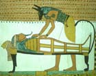 Anubis embalming Sennedjem in the tomb of Sennedjem, wall painting 1292 BC, Thebes, Egypt