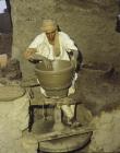 Potter at wheel in village between Asyut and Cairo, Egypt