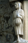 Chartres North Porch right bay first archivolt October a sower holding a bag of seed 13th century