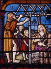 Adam constructing his house and Eve with their children 16th century panel in The Creation Window Church of La Madeleine Troyes France