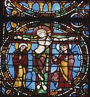Crucifixion scene from the Passion window, 12th century stained glass, west end, Chartres Cathedral, France
