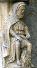 Chartres Cathedral, north porch, right bay, first archivolt, February, man by fire, 13th century