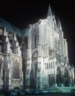 South transept and porch, window of Vendome Chapel on left, floodlit, Chartres Cathedral, France