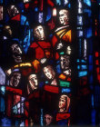 Salisbury Cathedral, Trinity Chapel, Prisoners of Conscience window by Gabriel Loire, lancet D, panel 9, thirteen heads, in Gabriel Loire