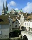 Chartres Cathedral, seen above houses from Pont du Bourg, Chartres, France