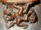 Misericord of sword play at the fair, fifteenth century, Church of La Trinite, Vendome, France