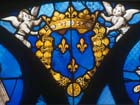 Coat of arms, detail in tracery of the Tullier window, 16th century stained glass, Bourges Cathedral, France