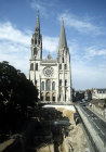 Chartres Cathedral, west end and excavated remains of first century Roman building in foreground, Chartres, France