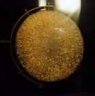 Phaestos Disc, fired clay disc from Minoan palace at Phaestos, Heraklion Museum, Crete, Greece