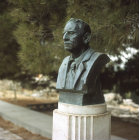 Greece, Crete,  Knossos, Palace of Minos, bust of Sir Arthur Evans, archaeologist of Knossos