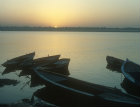 Sunrise on the Ganges, with boats, Benares, India
