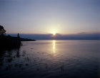 Israel, Sea of Galilee at dawn, St Peters Church on the shores at Tabgha