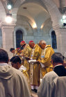 Israel, Catholic Priests pray at Midnight Mass, Christmas Eve at St Catherines Church, Bethlehem
