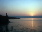 Sunrise over Sea of Galilee and Church at Tabgha, Israel