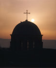 Israel, Bethany, doves on Dome of Church at sunrise