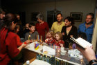 Israel modern Jewish families light Hanukkah candles together