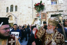 Israel, Jerusalem, Greek Orthodox Archbishop outside the Holy Sepulchre Church for Maundy Thursday feet washing