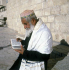 Israel, Jerusalem, Moroccan Sephardic Jew reading his prayer book in the morning
