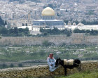 Israel, Jerusalem, the Dome of the Rock, an  Arab  and his donkey, the city wall and the Golden gate
