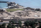 Israel Caesarea, aerial view of excavations of the Crusader City from the east with harbour beyond