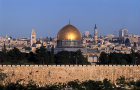 Israel, Jerusalem, sunrise lights up the Old City, the Dome of the Rock and west Jerusalem