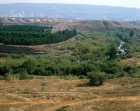 Israel, a loop of the river Jordan south of Galilee, the Gilead Mountains of Jordan are in the distance