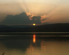 Sun setting over Sea of Galilee, Israel