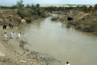 Christian Orthodox baptism at Qasr El-Yahud, on the river Jordan, reputed site of Christ