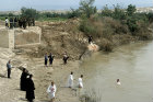 Christian Orthodox baptism at Qasr El-Yahud, on the river Jordan, reputed site of Christ