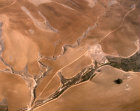 Israel, aerial view of dried-up wadi and ploughland near Be