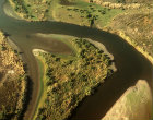 Israel, aerial of River Jordan, north of Galilee,taken in 1984, before excessive extraction reduced its flow