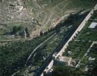Tomb of Absolom, and the bricked-up Golden Gate in the city walls, aerial view, Kidron Valley, Israel
