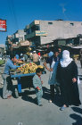 Israel, Gaza, veiled woman at the vegetable market