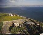 Synagogue and Peters House, Sea of Galilee beyond, aerial view, Capernaum, Israel