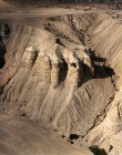 Qumran caves where Dead Sea Scrolls were found in 1947, aerial view from east, Israel