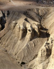 Qumran caves where the Dead Sea Scrolls were found in 1947, aerial view from east, Israel