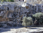 Hinnom valley, tombs in rocks below monastery of St Onuphrius, Jerusalem, Israel