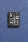 Byzantine black pendant showing sacrifice of Isaac, fifth to seventh century AD in Shlomo Moussaeiff