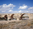 High-level aqueduct dating from time of Herod, evening light, Caesarea, Israel