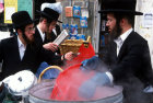 Israel Jerusalem Ultra-Orthodox Jews boil utensils to make them Kosher for Pesach Passover Festival